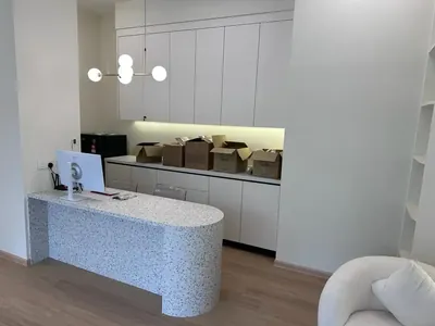 Aessence Clinic: Reception counter at the Penang branch (photo taken during setup, boxes visible)