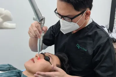 O2 Clinic: Doctor performing a facial laser treatment at O2 Klinik